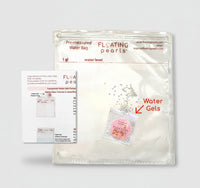 Floating Pearls floating gels set with pre-measured water bag and water gels on a beige background.